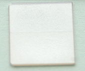 Judy Ellis's Gem Profile- Strontium Titanate -Fabulite - , General Education, , A plate cut out of synthetic SrTiO3 crystal