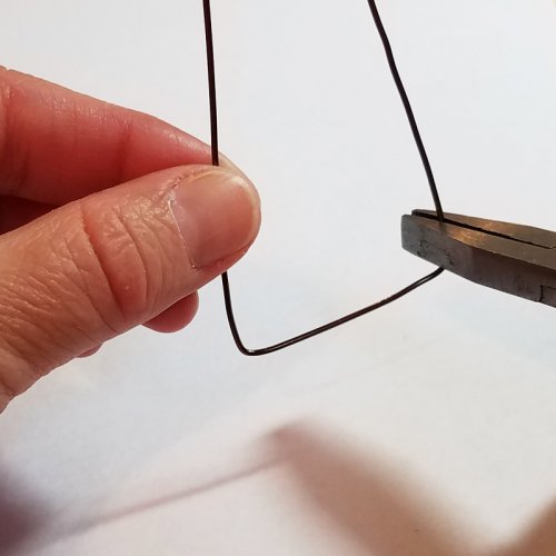 Debbie Blair's Beaded Wire Bird Pendant - , Contemporary Wire Jewelry, Forging, Forging Jewelry, Jewelry Forging, Lashing, Wire Lashing, Beads, Use flat-nose pliers to square up 