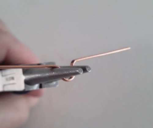 Judy Freyer Thompson's Quick and Easy Fibula Pin - , Findings & Components, Toggles & Clasps, Earwire & Headpin, Findings, Clasps, Components, Grab the wire with the round nose pliers