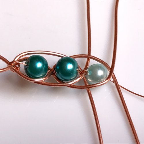 Erika Pal's Xs and Os Beaded Wire Bracelet - , Contemporary Wire Jewelry, Lashing, Wire Lashing, Loops, Wire Loop, Wrapped Wire Loop, Weaving, Wire Weaving, Weaving Wire, Beads, , Now take the lower base wire from the left side