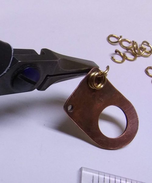 Judy Larson's Mixed Metal Sampler Bracelets Series    PUTTING IT ALL TOGETHER  - , Metalwork, Filing, Finishing, Oxidizing Wire, Oxidizing, Antiquing Wire, Antiquing, Design, Put an open jump ring in one corner hole of the O ring toggle.