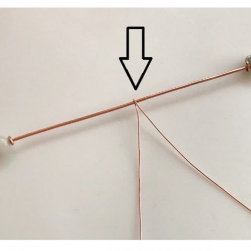 Erika Pal's Boho Beaded Ring - , Contemporary Wire Jewelry, Weaving, Wire Weaving, Weaving Wire, Take one of the base wires.