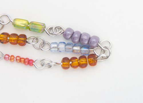 Kylie Jones's Sterling Silver Rainbow Bracelet - , Contemporary Wire Jewelry, Loops, Wire Loop, Wrapped Wire Loop, Open one of the 1/8 rings and go through the end loops 