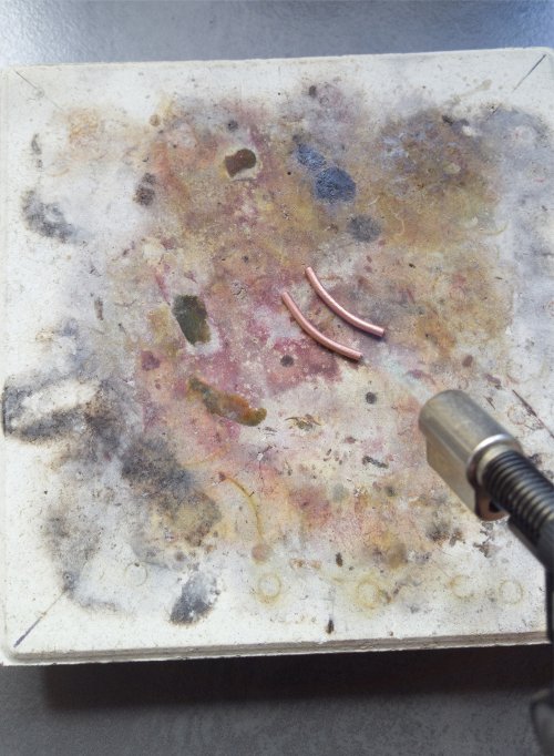 Kylie Jones's Curved Tube Bead Earrings - , Contemporary Wire Jewelry, Loops, Wire Loop, Wrapped Wire Loop, Butane Torch, Soldering, Solder, I use a small butane torch 