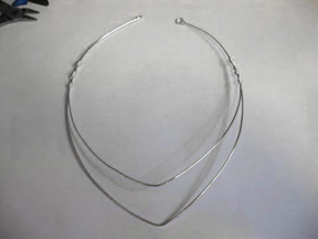 Tracey McKenzie's Lightning Storm - , Contemporary Wire Jewelry, Wire Wrapping, Wrapping, Wire Wrapping Jewelry, Wrapping outer wire frame around inner wire frame.