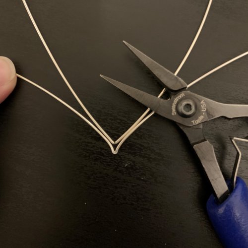 Kendra Austin's Filigree Heart Pendant - Shape the First Point, Contemporary Wire Jewelry, Weaving, Wire Weaving, Weaving Wire, You can decide how much of a point you leave in the second wire