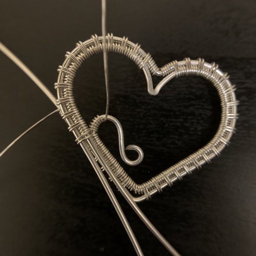 Kendra Austin's Filigree Heart Pendant - Attach the Top to the Bottom, Contemporary Wire Jewelry, Weaving, Wire Weaving, Weaving Wire, ensure the end is on the top of the pendant 