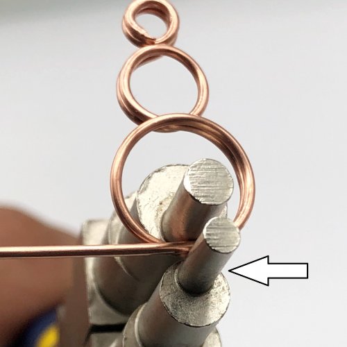 Erika Pal's Loop in Loop Earrings - , Contemporary Wire Jewelry, Loops, Wire Loop, Wrapped Wire Loop, Hold the bottom center of the bigger loop