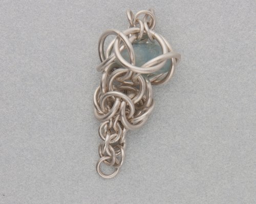 Kylie Jones's Inverted round maille temple earrings - , Chain Maille Jewelry, Making Chain, Chain Making , Add two rows of 3.2mm rings that taper to one ring at the top of the earring.