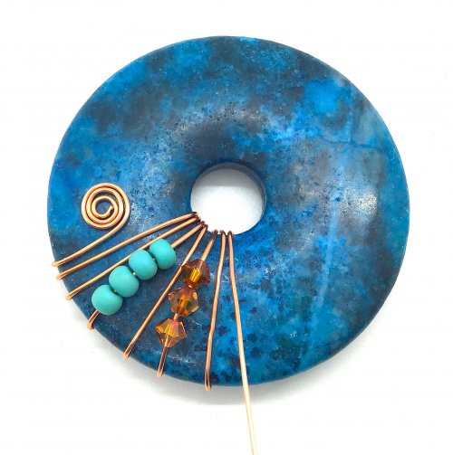 Kristal Wick's Time to Make the Donuts - , Contemporary Wire Jewelry, Spirals, Wire Spiral, Spiral Wire Wrap, Wire Wrapping, Wrapping, Wire Wrapping Jewelry, , Add 3 crystals and wrap twice through the donut hole