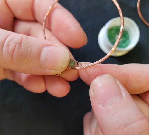 Jennifer Brooks's Dyer's Mushroom Netted Hoop Pendant - , Contemporary Wire Jewelry, Lashing, Wire Lashing, Wire Wrapping, Wrapping, Wire Wrapping Jewelry, , keeping the wire on the same side you started on.
