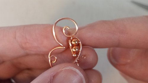Elizabeth Schultz's Butterfly Swirly Wire Earrings - , Contemporary Wire Jewelry, Coiling, Coiling Wire, Wire Coiling, Lashing, Wire Lashing, Loops, Wire Loop, Wrapped Wire Loop, Wire Wrapping, Wrapping, Wire Wrapping Jewelry, begin wrapping the bottom swirl 
