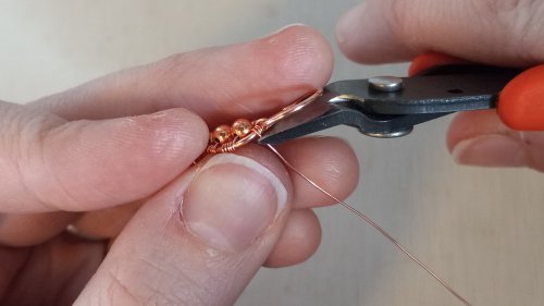 Elizabeth Schultz's Butterfly Swirly Wire Earrings - , Contemporary Wire Jewelry, Coiling, Coiling Wire, Wire Coiling, Lashing, Wire Lashing, Loops, Wire Loop, Wrapped Wire Loop, Wire Wrapping, Wrapping, Wire Wrapping Jewelry, Use your flush cutters to trim off the excess wire.