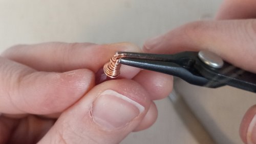 Elizabeth Schultz's Butterfly Swirly Wire Earrings - , Contemporary Wire Jewelry, Coiling, Coiling Wire, Wire Coiling, Lashing, Wire Lashing, Loops, Wire Loop, Wrapped Wire Loop, Wire Wrapping, Wrapping, Wire Wrapping Jewelry, Tuck in the little bur at the end.