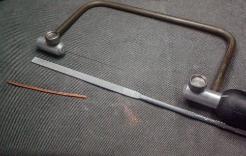 Kylie Jones's Beaded RIng Pendant - , Contemporary Wire Jewelry, Texturing, Butane Torch, Soldering, Solder, file the ends smooth