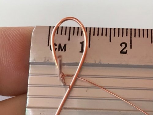 Erika Pal's Lucky Clover Pendant - , Contemporary Wire Jewelry, Wire Wrapping, Wrapping, Wire Wrapping Jewelry, bend the longer wire into a petal