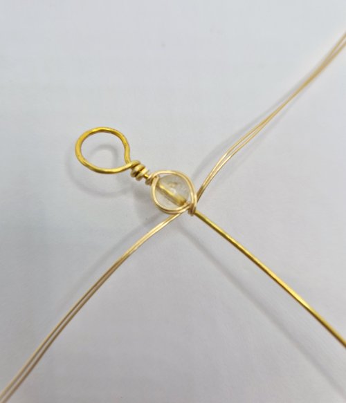 Natalie Patten's Bead and Wire Bracelet with Attached Clasp - , Contemporary Wire Jewelry, Wire Wrapping, Wrapping, Wire Wrapping Jewelry, bring the other wires around the bead