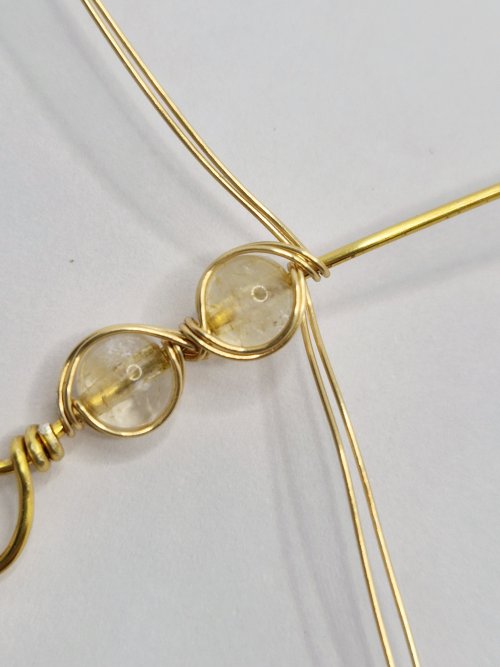 Natalie Patten's Bead and Wire Bracelet with Attached Clasp - , Contemporary Wire Jewelry, Wire Wrapping, Wrapping, Wire Wrapping Jewelry, wrap the fine wires around the base wire