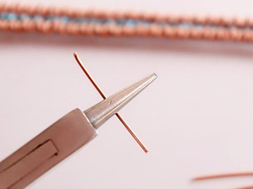 Erika Pal's Triple Strand Braided Wire Bracelet - , Contemporary Wire Jewelry, Wire Wrapping, Wrapping, Wire Wrapping Jewelry, Weaving, Wire Weaving, Weaving Wire, hold the center of the wire with round-nose pliers