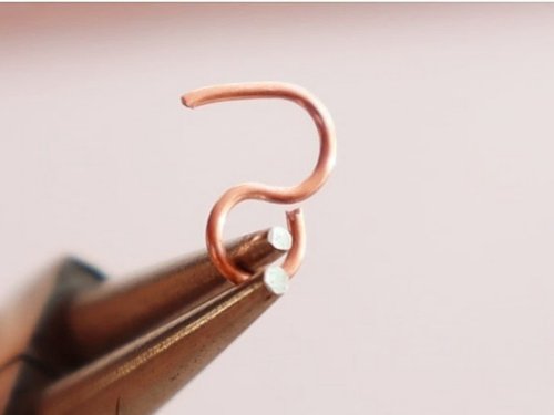 Erika Pal's Triple Strand Braided Wire Bracelet - , Contemporary Wire Jewelry, Wire Wrapping, Wrapping, Wire Wrapping Jewelry, Weaving, Wire Weaving, Weaving Wire, close one side of the s-hook