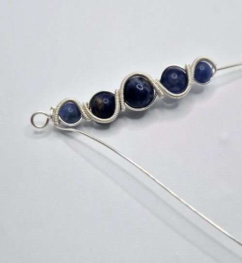 Natalie Patten's Graduated Bead Component - , Contemporary Wire Jewelry, Wire Wrapping, Wrapping, Wire Wrapping Jewelry, start to wrap the other end of the 20g wire