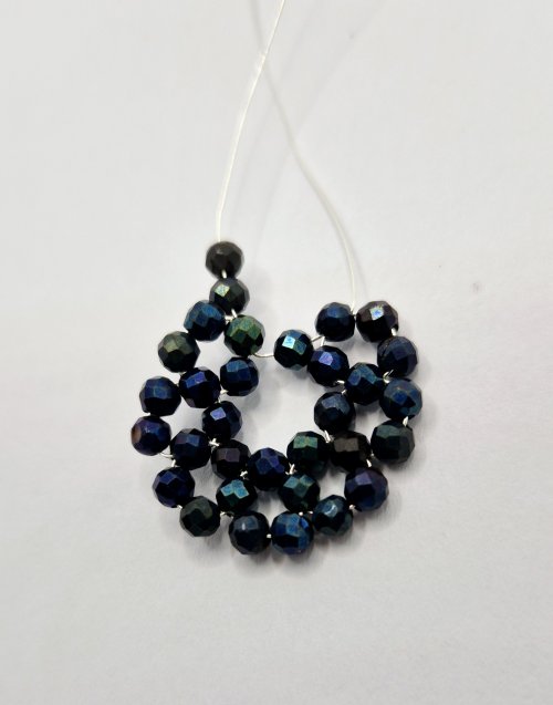 Natalie Patten's Bead and Wire Circular Component - , Contemporary Wire Jewelry, Weaving, Wire Weaving, Weaving Wire, Beads, 13.	Bring the inner side wire with one bead on it, through the first bead on the starting loop of beads already formed that is closest to it.