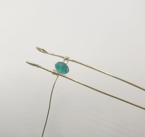 Natalie Patten's Simple Beaded Bangle Bracelet - , Contemporary Wire Jewelry, Wire Wrapping, Wrapping, Wire Wrapping Jewelry, slip the wire back through the bead