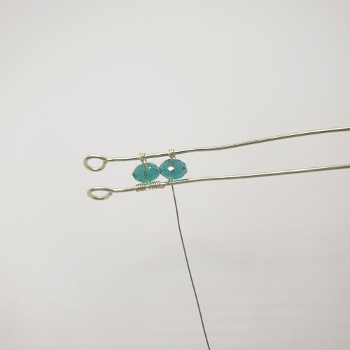 Natalie Patten's Simple Beaded Bangle Bracelet - , Contemporary Wire Jewelry, Wire Wrapping, Wrapping, Wire Wrapping Jewelry, wrap the next wire and come back through the bead