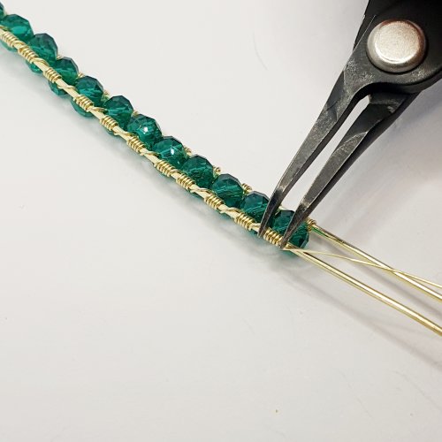 Natalie Patten's Simple Beaded Bangle Bracelet - , Contemporary Wire Jewelry, Wire Wrapping, Wrapping, Wire Wrapping Jewelry, use pliers to compress the wrapped wire
