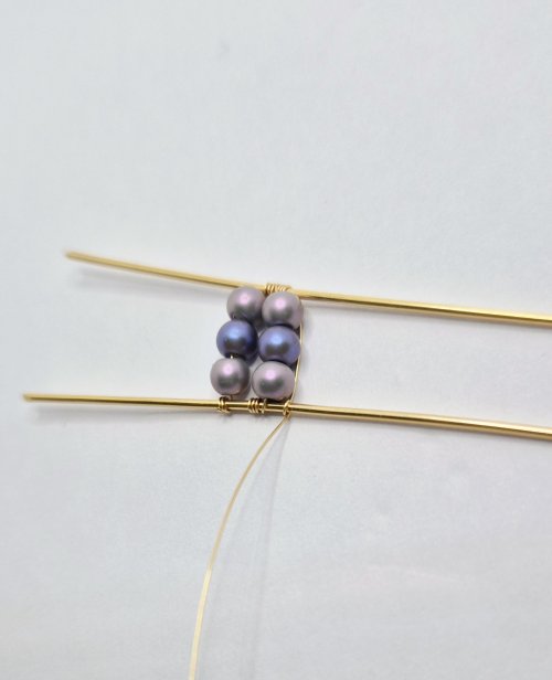 Natalie Patten's Channel-set Beaded Cuff Bracelet - , Contemporary Wire Jewelry, Wire Wrapping, Wrapping, Wire Wrapping Jewelry, wrap the top base wire 3 times and bring the wire back down next to the beads