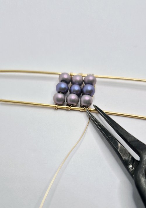 Natalie Patten's Channel-set Beaded Cuff Bracelet - , Contemporary Wire Jewelry, Wire Wrapping, Wrapping, Wire Wrapping Jewelry, use pliers to compress the wrapped wires