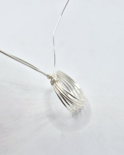 Natalie Patten's Lotus Pendant - , Contemporary Wire Jewelry, Wire Wrapping, Wrapping, Wire Wrapping Jewelry, wrap one tail through loop