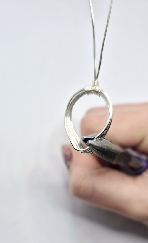 Natalie Patten's Lotus Pendant - , Contemporary Wire Jewelry, Wire Wrapping, Wrapping, Wire Wrapping Jewelry, Apply pressure on both sides