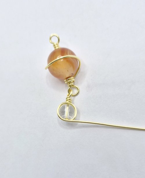 Natalie Patten's Planet Jewellery - , Contemporary Wire Jewelry, Wire Wrapping, Wrapping, Wire Wrapping Jewelry, bring the wire in front of drill hold to cover