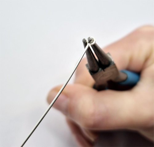 Natalie Patten's Herringbone Weave Connectors - , Contemporary Wire Jewelry, Making Chain, Chain Making , Findings, Clasps, Components, Wire Wrapping, Wrapping, Wire Wrapping Jewelry, Tilt the loop around the pliers