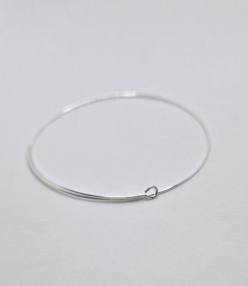 Natalie Patten's Herringbone Memory Wrap Wire Bangle - , Contemporary Wire Jewelry, Wire Wrapping, Wrapping, Wire Wrapping Jewelry,  twisted and repositioned 