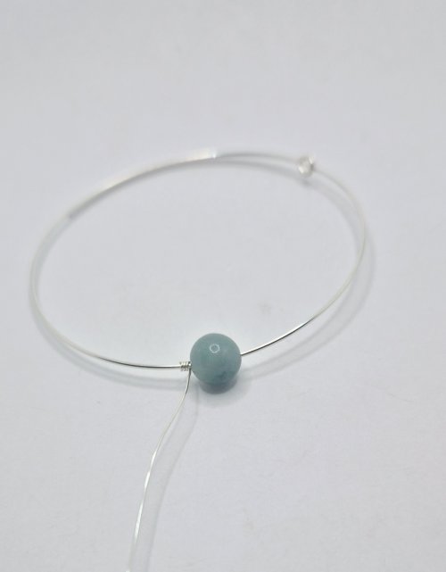 Natalie Patten's Herringbone Memory Wrap Wire Bangle - , Contemporary Wire Jewelry, Wire Wrapping, Wrapping, Wire Wrapping Jewelry, Trim off the starting tail of the weaving wire 