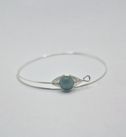 Natalie Patten's Herringbone Memory Wrap Wire Bangle - , Contemporary Wire Jewelry, Wire Wrapping, Wrapping, Wire Wrapping Jewelry, Slide the woven bead 