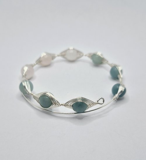 Natalie Patten's Herringbone Memory Wrap Wire Bangle - , Contemporary Wire Jewelry, Wire Wrapping, Wrapping, Wire Wrapping Jewelry, Continue adding on all of the beads 