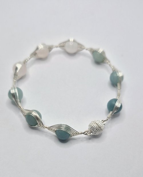 Natalie Patten's Herringbone Memory Wrap Wire Bangle - , Contemporary Wire Jewelry, Wire Wrapping, Wrapping, Wire Wrapping Jewelry, A clasp can be added to the loops