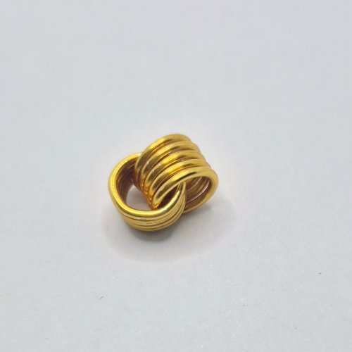 Natalie Patten's Love Knot Bead Components  - , Contemporary Wire Jewelry, Coiling, Coiling Wire, Wire Coiling,  sit inside of each other.