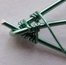 Albina Manning's Birch Leaf Earrings - , Wire Weaving, Coiling, Coiling Wire, Wire Coiling, Wire Wrapping, Wrapping, Wire Wrapping Jewelry, Weaving, Wire Weaving, Weaving Wire, Wrap the wrapping wire around the midrib.