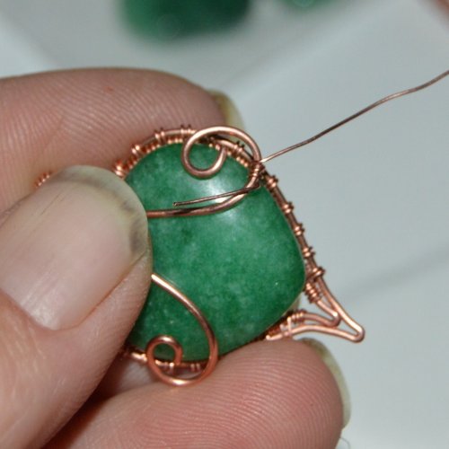 Deborah Kelly's Woven Heart Earrngs - , Wire Weaving, Weaving, Wire Weaving, Weaving Wire, Use the wire to stitch the spiral to the weave