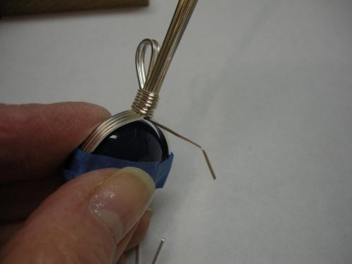 Judy Larson's Sweetheart Round Cabochon Pendant - , Classic Wire Jewelry, Wire Wrapping, Wrapping, Wire Wrapping Jewelry,  Pull the wire tightly to the front.