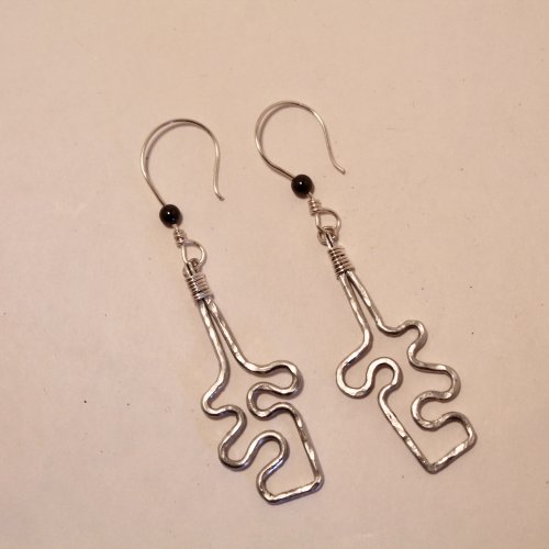Judy Freyer Thompson's Jigsaw Puzzle Earrings, Contemporary Wire Jewelry. Forging, Forging Jewelry, Jewelry Forging, Texturing, Wire Wrapping, Wrapping, Wire Wrapping Jewelry. I have become somewhat addicted to aluminum wire lately.