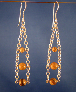 Sherrie Lingerfelt's Chain Ladder Earrings, Contemporary Wire Jewelry. Loops, Wire Loop, Wrapped Wire Loop. This attractive earring design gives desired length and color, but without a lot of weight.