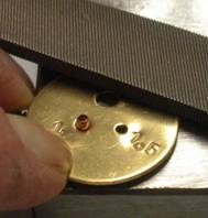 Judy Larson's Using Tiles on Tube Rivets and Eyelets - Step 3, Metalwork, How To Punch Holes, Hole Punching, Punch A Hole, Riveting, Riveting Techniques, Wire Rivets, Design, Tools, Filing a rivet tube