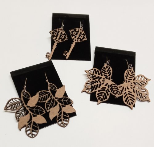 Judy Larson's Making Lightweight Earrings with Unexpected Finds - , General Education, Design, , Three pairs of delicately laser-cut wooden earrings