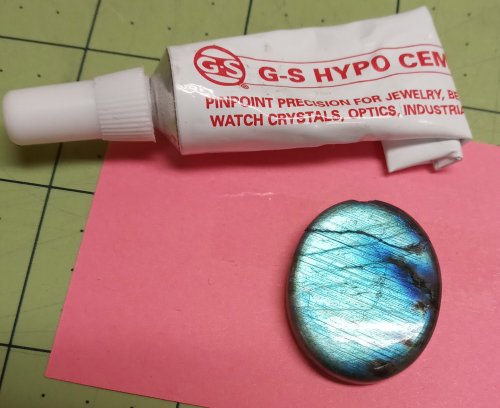 Judy Larson's Tool Tip - Indispensable Tapes - , General Education, , gemstone resting on a pink surface.
